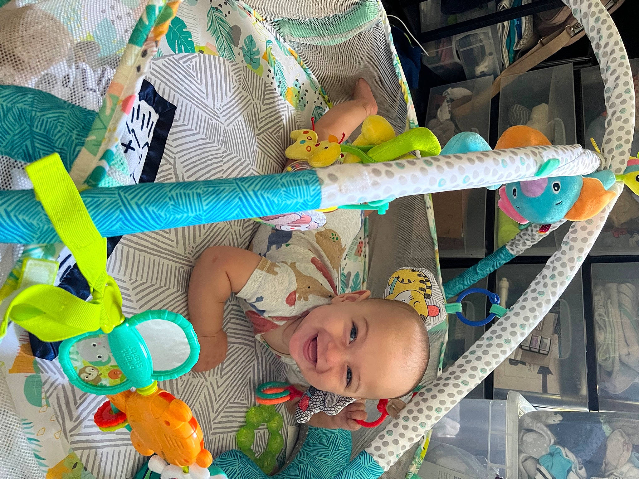 Bryson is registered to the contest to win money with this photo: baby, baby_products, baby_safety, baby_toddler_clothing, baby_toys, child, cradle, fun, green, infant_bed, joy, linens, nursery, pattern, person, plastic, product, room, smile, stuffed_toy