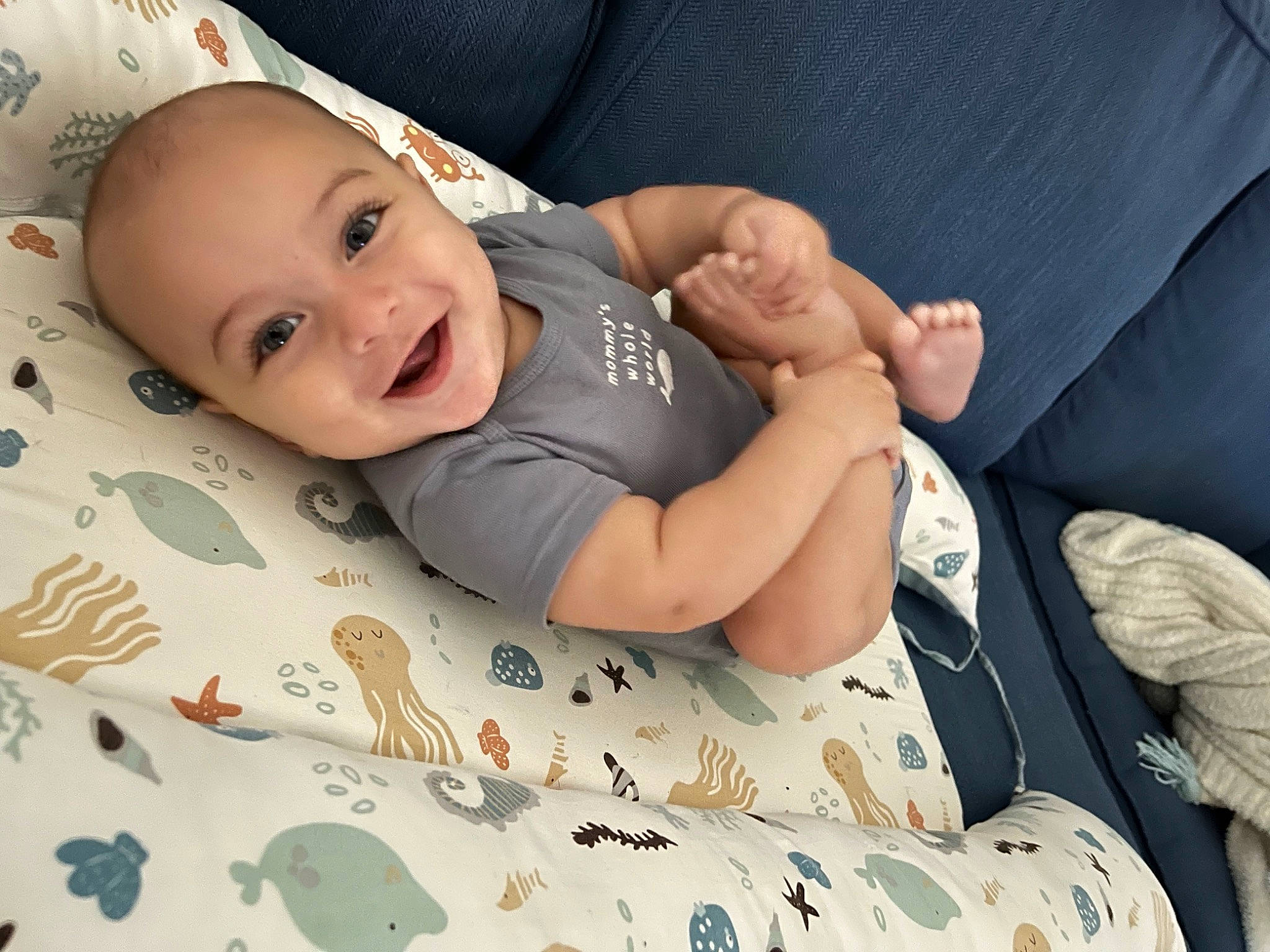 Bryson joined the competition — help win amazing prizes! arm, baby, baby_laughing, baby_products, baby_toddler_clothing, child, comfort, facial_expression, finger, flash_photography, flooring, fun, hand, happy, joy, nail, pattern, person, skin, smile