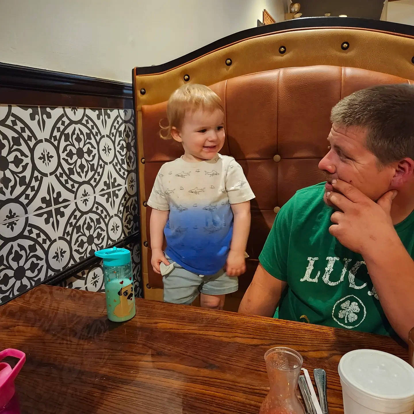 Myles joined the competition — help win amazing prizes! chair, child, cup, drink, drinkware, event, fun, happy, leisure, person, plate, room, serveware, sharing, sitting, t_shirt, table, tableware, toddler, wood