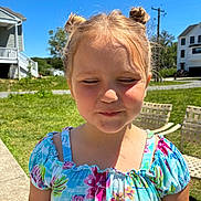 Willow is registered to the contest to win money with this photo: child, girl, outdoor, sunlight, hair_buns, dress, colorful_clothing, grass, sidewalk, residential_area, house, summer, daylight, smile, face, portrait, happy, young, cute, nature