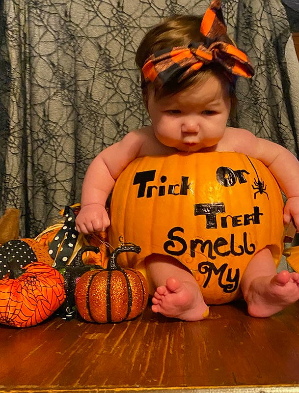 Rylie is registered to the contest to win money with this photo: baby, baby_toddler_clothing, calabaza, child, cucurbita, eye, facial_expression, gourd, happy, head, human_body, natural_foods, orange, person, plant, pumpkin, squash, t_shirt, toddler, vegetable