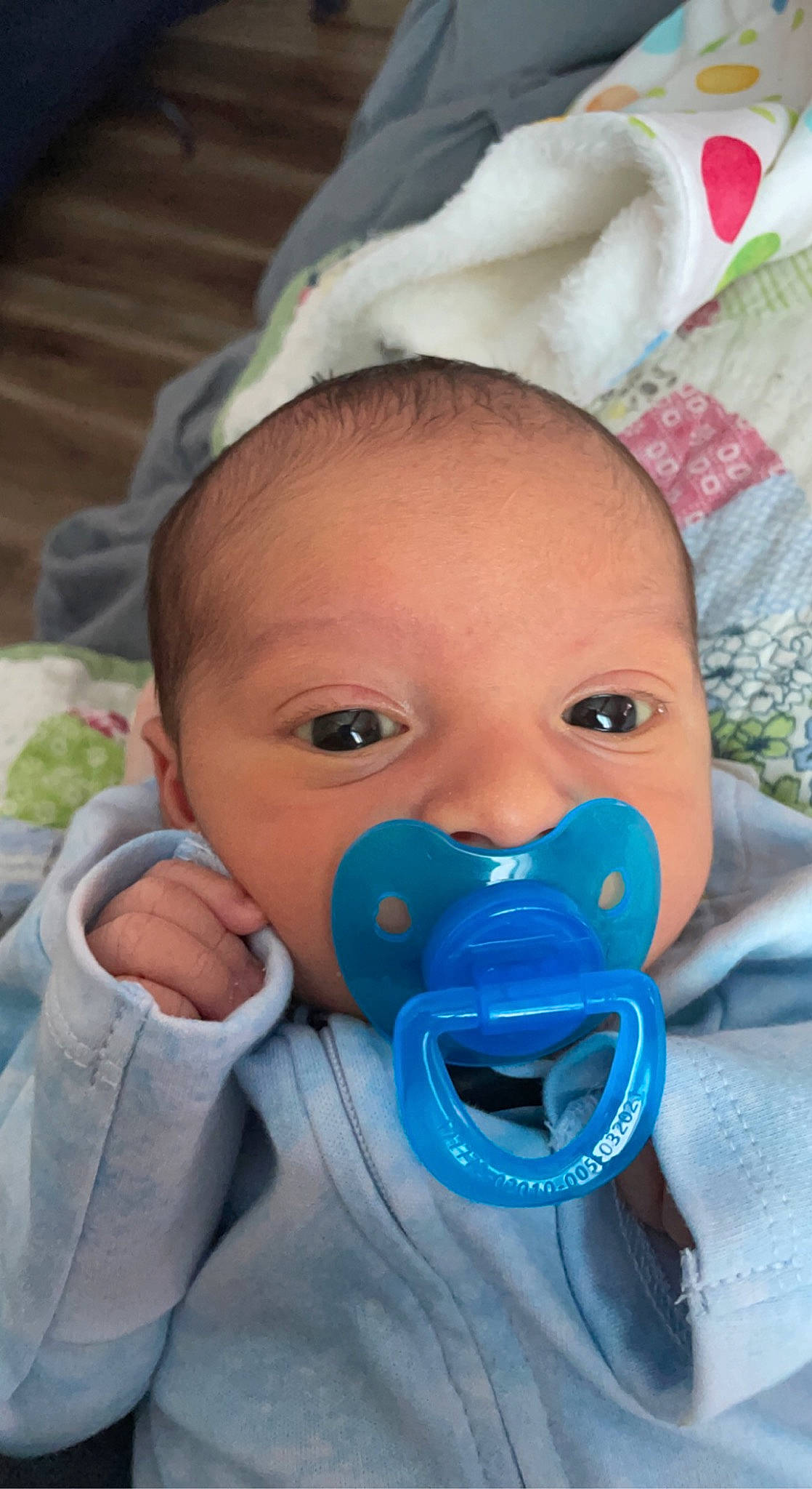 Makai is registered to the contest to win money with this photo: baby, baby_toddler_clothing, cheek, child, close_up, electric_blue, eye, eyebrow, eyelash, face, happy, iris, mouth, nose, organ, person, skin, smile, textile, toddler