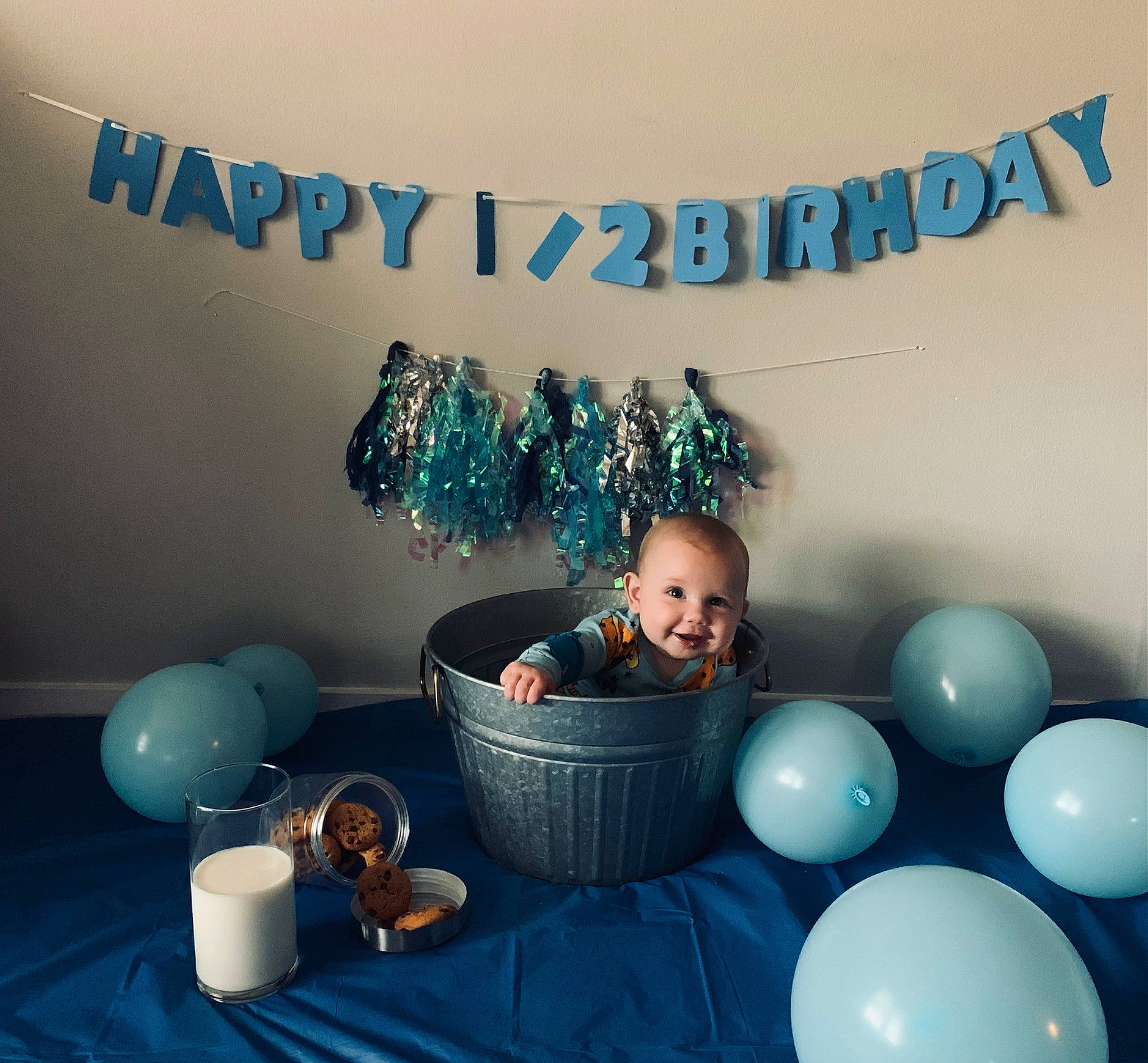 Jayson joined the competition — help win amazing prizes! aqua, azure, balloon, circle, electric_blue, event, font, happy, illustration, joy, mammal, party, party_supply, person, room, sitting, still_life_photography, stock_photography, table, tableware
