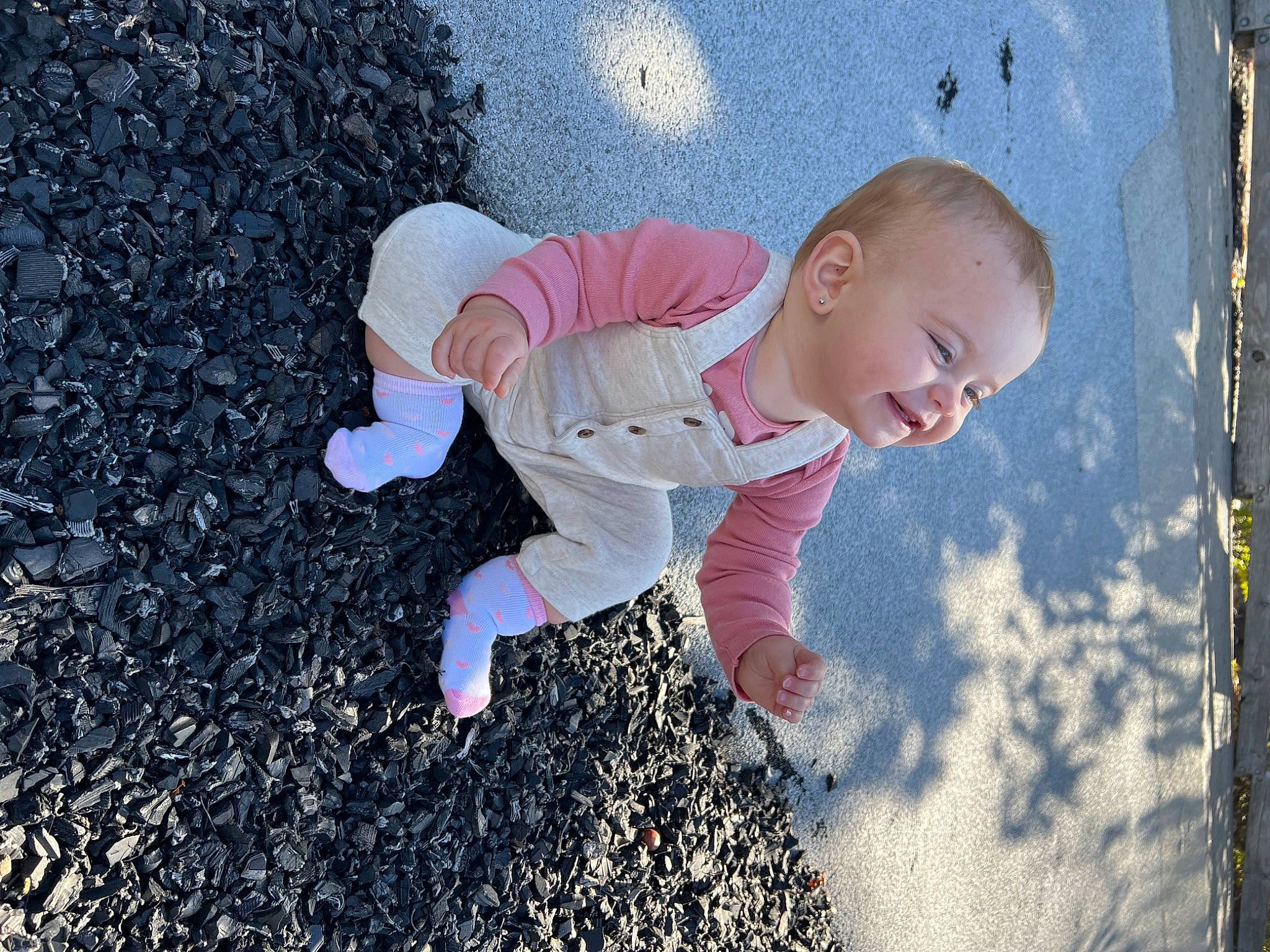 Avalynn is registered to the contest to win money with this photo: asphalt, baby, baby_toddler_clothing, child, electric_blue, fun, grass, happy, leaf, morning, people_in_nature, person, play, road_surface, sand, shadow, sitting, soil, tints_and_shades, toddler