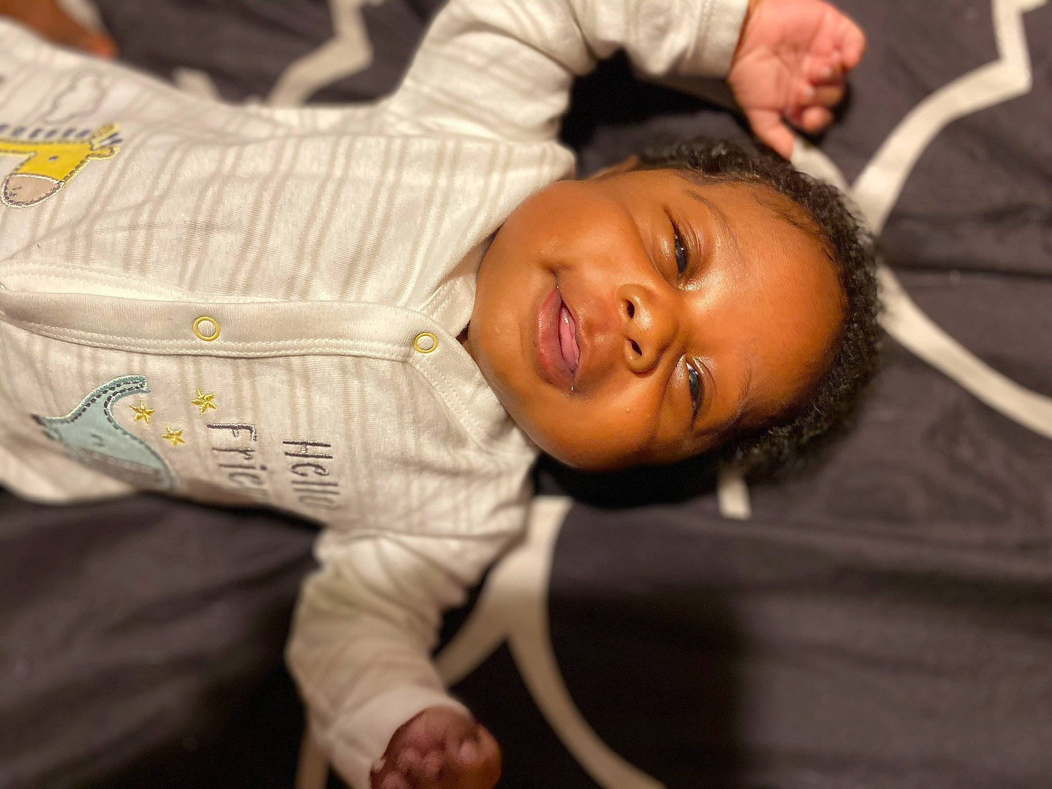 Javon is registered to the contest to win money with this photo: baby, baby_toddler_clothing, basketball_hoop, cheek, child, eyelash, hearing, mouth, person, toddler
