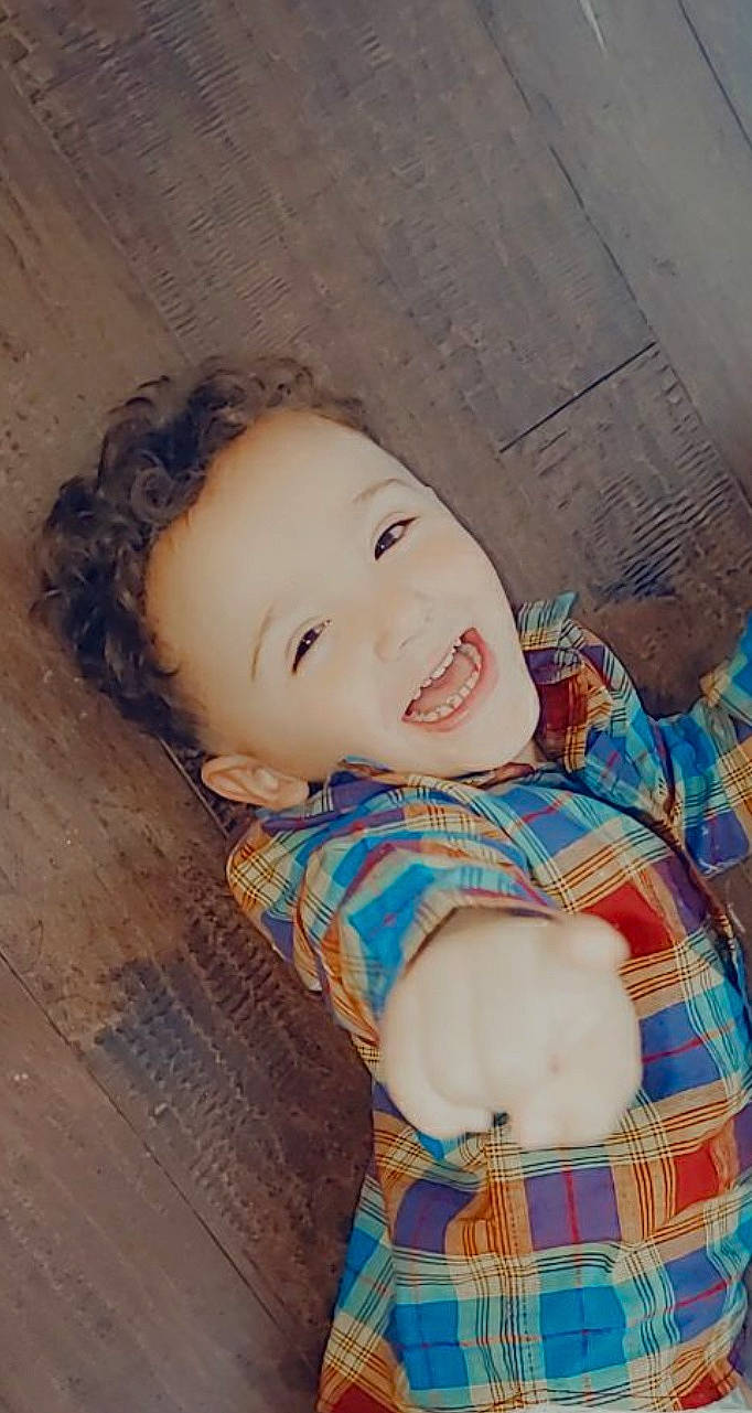 Manny joined the competition — help win amazing prizes! baby, baby_laughing, baby_products, baby_toddler_clothing, button, cheek, forehead, iris, joy, lip, pattern, person, plaid, portrait, portrait_photography, tartan, textile, toddler, tooth