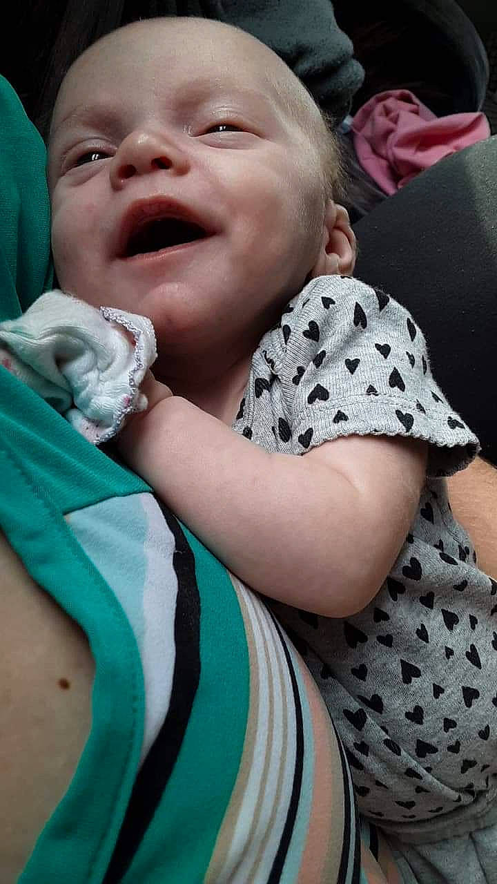 Cara is registered to the contest to win money with this photo: baby, cheek, child, facial_expression, laugh, mouth, nose, person, skin, smile, toddler, tongue, yawn