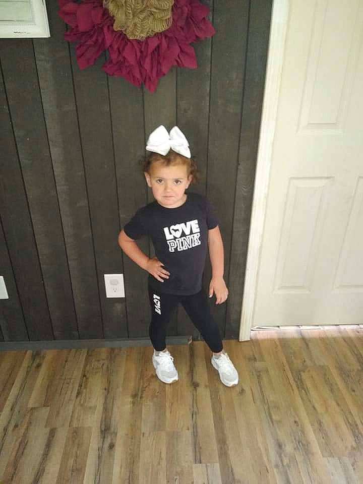 Lexie joined the competition — help win amazing prizes! baby_toddler_clothing, child, costume, floor, flooring, hardwood, person, shoe, sleeve, sportswear, t_shirt, toddler, wood