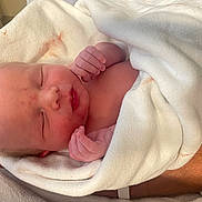 Davian joined the competition — help win amazing prizes! newborn, baby, infant, blanket, sleeping, wrapping, skin, face, hand, person, resting, human, cute, peaceful, fresh, small, wrapped, cuddly, soft, newborn_baby
