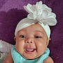 Niecey joined the competition — help win amazing prizes! baby, infant, child, headband, flower, smile, tongue, cheeks, eyes, portrait, close_up, purple_background, blanket, clothing, skin, cute, happy, face, fuzz, adorable