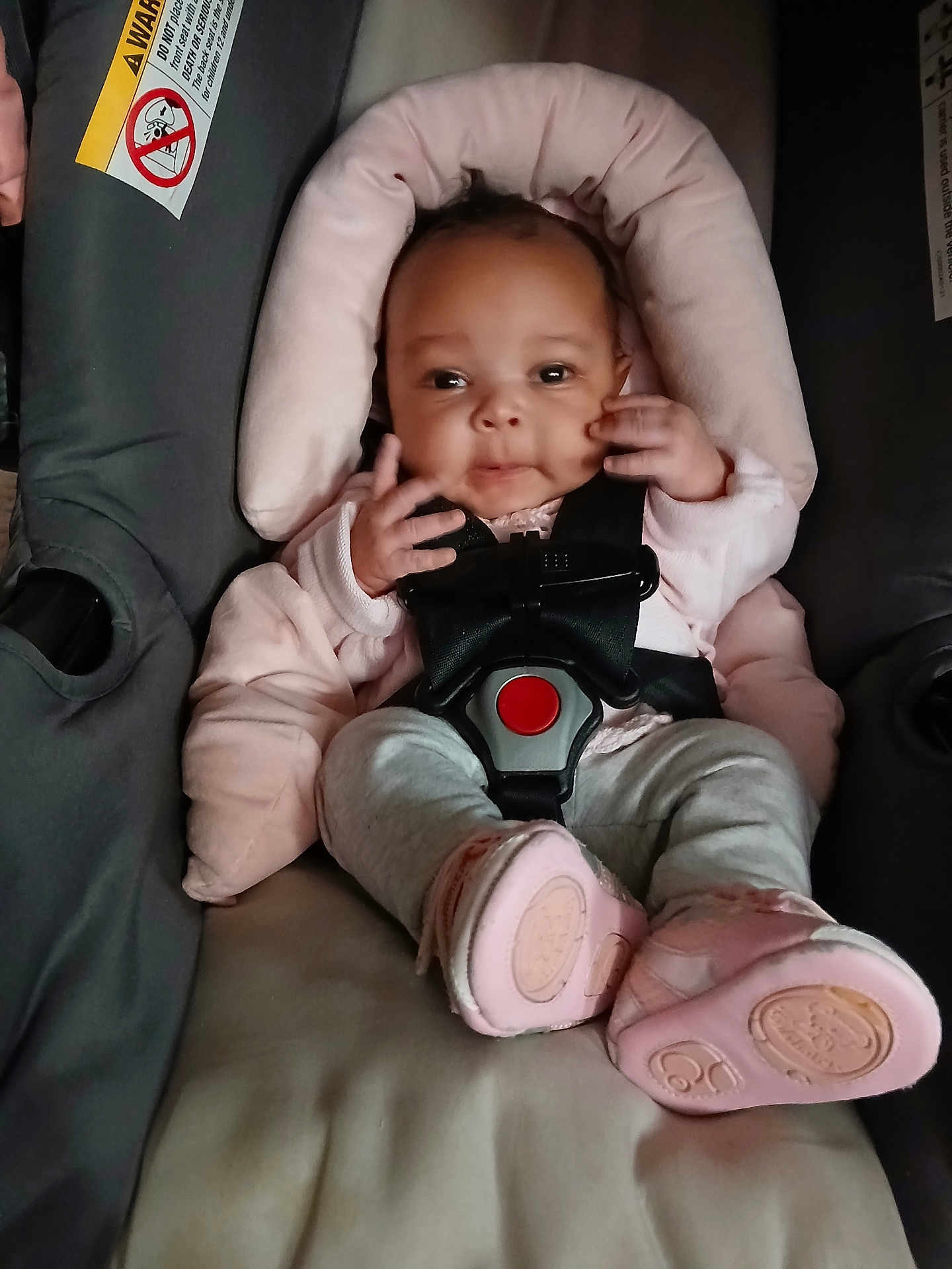 Niecey joined the competition — help win amazing prizes! baby, infant, child, car_seat, harness, buckle, pink, booties, onesie, hands, face, headrest, cushion, warning_label, seat, portrait, cute, smile, clothing, indoors