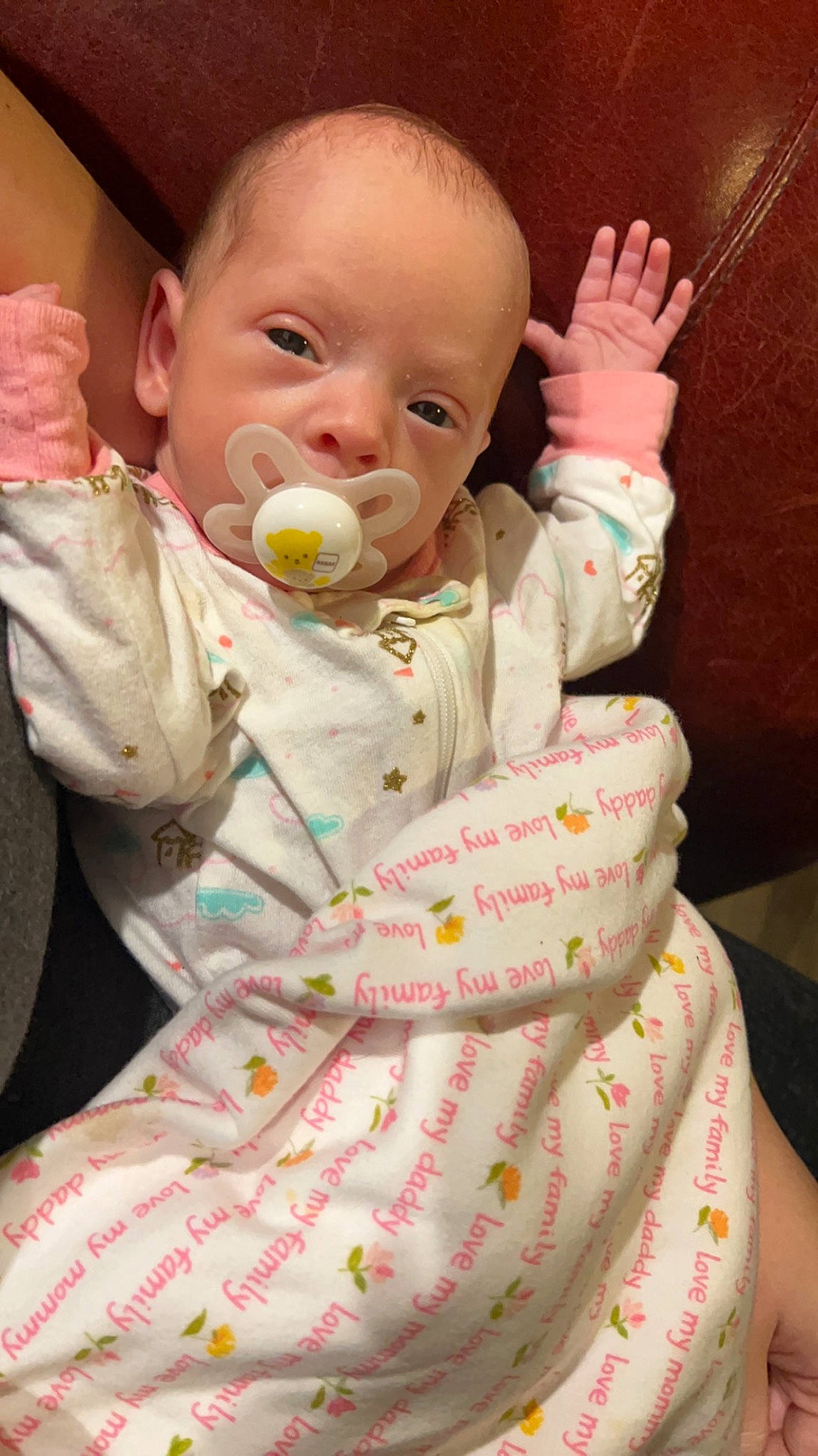 Piper is registered to the contest to win money with this photo: baby, baby_toddler_clothing, cheek, child, ear, eyelash, face, finger, gesture, happy, head, lip, mouth, neck, nose, person, pink, skin, sleeve, textile