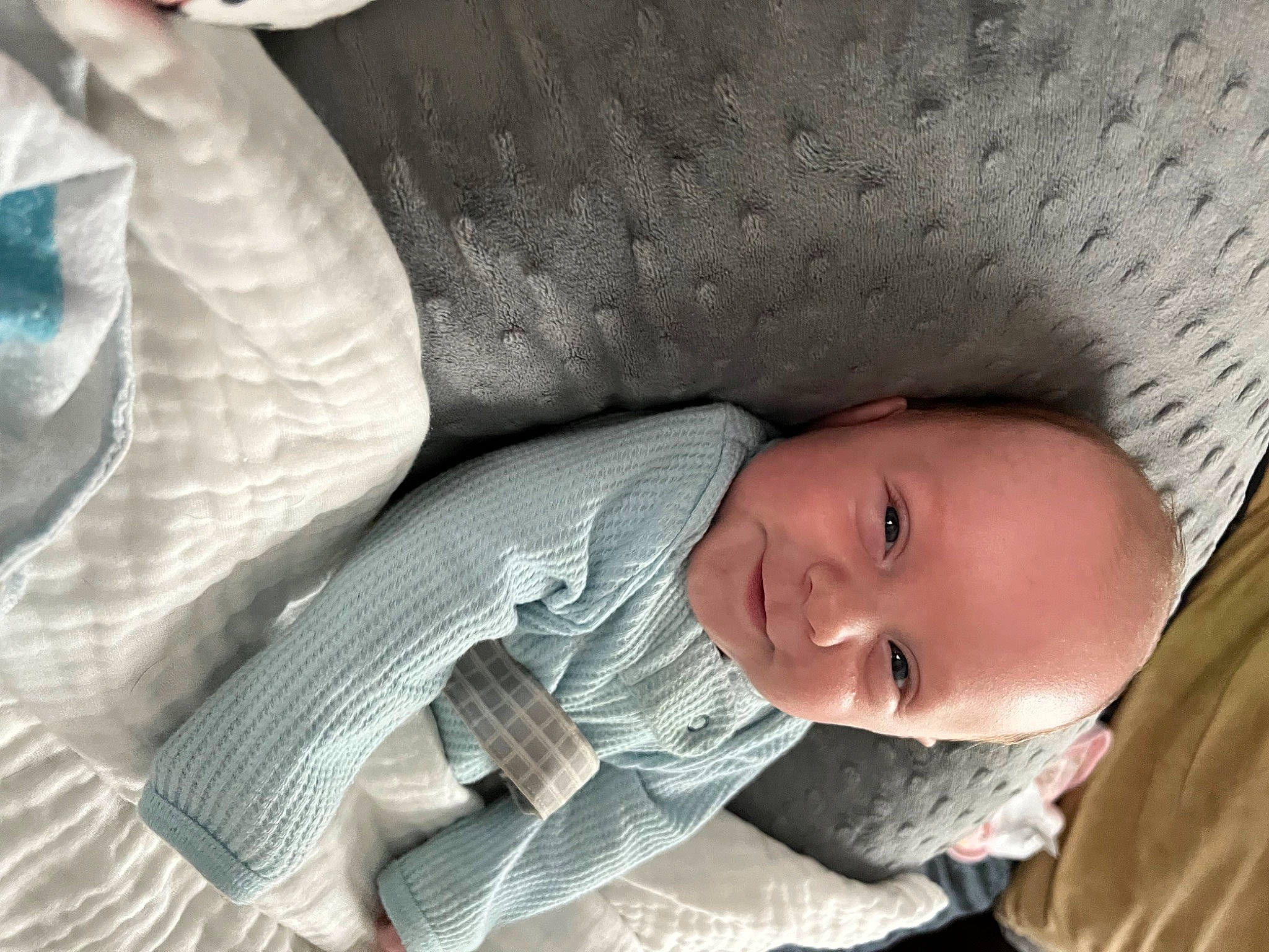 Gideon joined the competition — help win amazing prizes! baby, baby_products, baby_toddler_clothing, bedding, bedtime, child, comfort, eye, head, linens, monochrome, nap, pattern, person, room, sitting, sleep, smile, toddler, tree