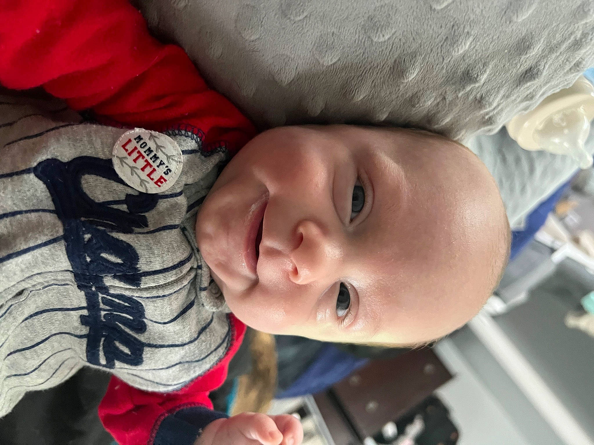 Gideon is registered to the contest to win money with this photo: baby, baby_products, baby_toddler_clothing, carmine, cheek, child, comfort, eyelash, happy, hat, lip, nose, pattern, person, plant, skin, sleeve, smile, toddler, tree