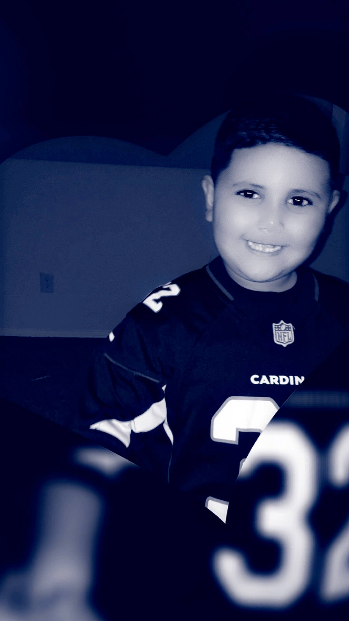 Mathayus is registered to the contest to win money with this photo: black_and_white, blue, child, cloud, cool, face, flash_photography, joy, male, night, person, photography, smile, space, style, t_shirt, uniform