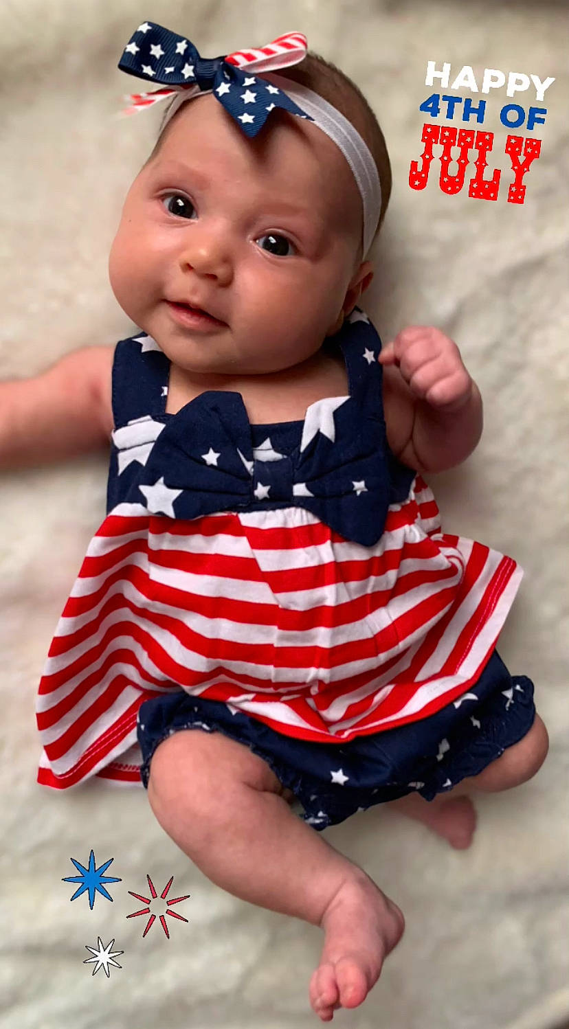 Riverlynn joined the competition — help win amazing prizes! baby, baby_toddler_clothing, baseball_cap, cap, cheek, child, day_dress, dress, finger, happy, headgear, lip, one_piece_garment, pattern, person, pink, red, skin, sleeve, thigh