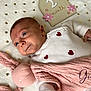 Giulia a rejoint le concours — aidez-le/la à gagner de superbes lots ! age_marker, baby, blanket, blue_eyes, cute, decorative_sign, face, flower_decorations, hand, heart_pattern, indoors, infant, lying_down, newborn, pink_bunny, portrait, red_hearts, skin, soft_toy, white_sweater