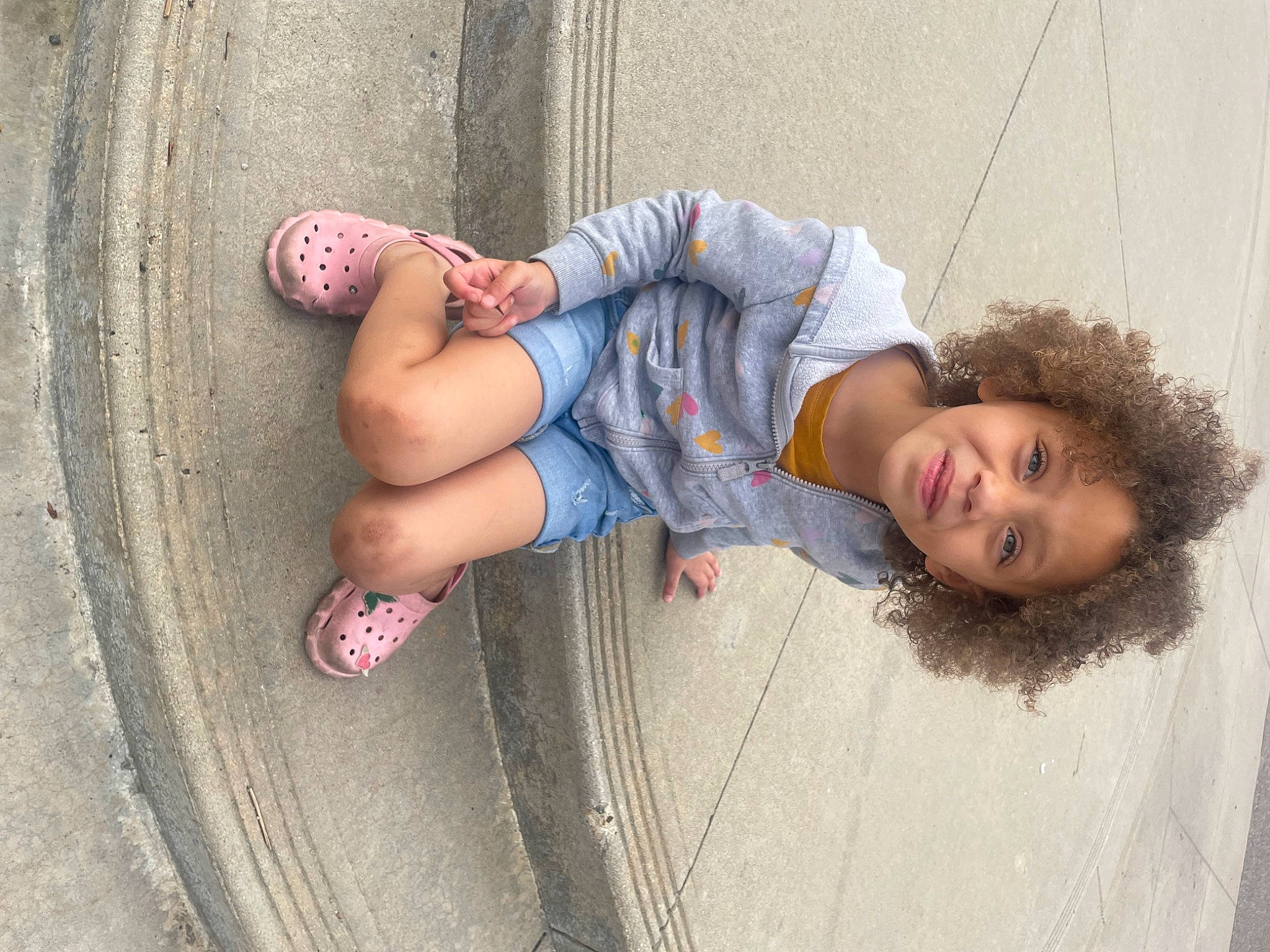 Paris joined the competition — help win amazing prizes! automotive_tire, concrete, cool, denim, eyewear, face, foot, human_body, human_leg, joy, knee, leg, person, road_surface, sandal, skin, sneakers, thigh, tire, trunk