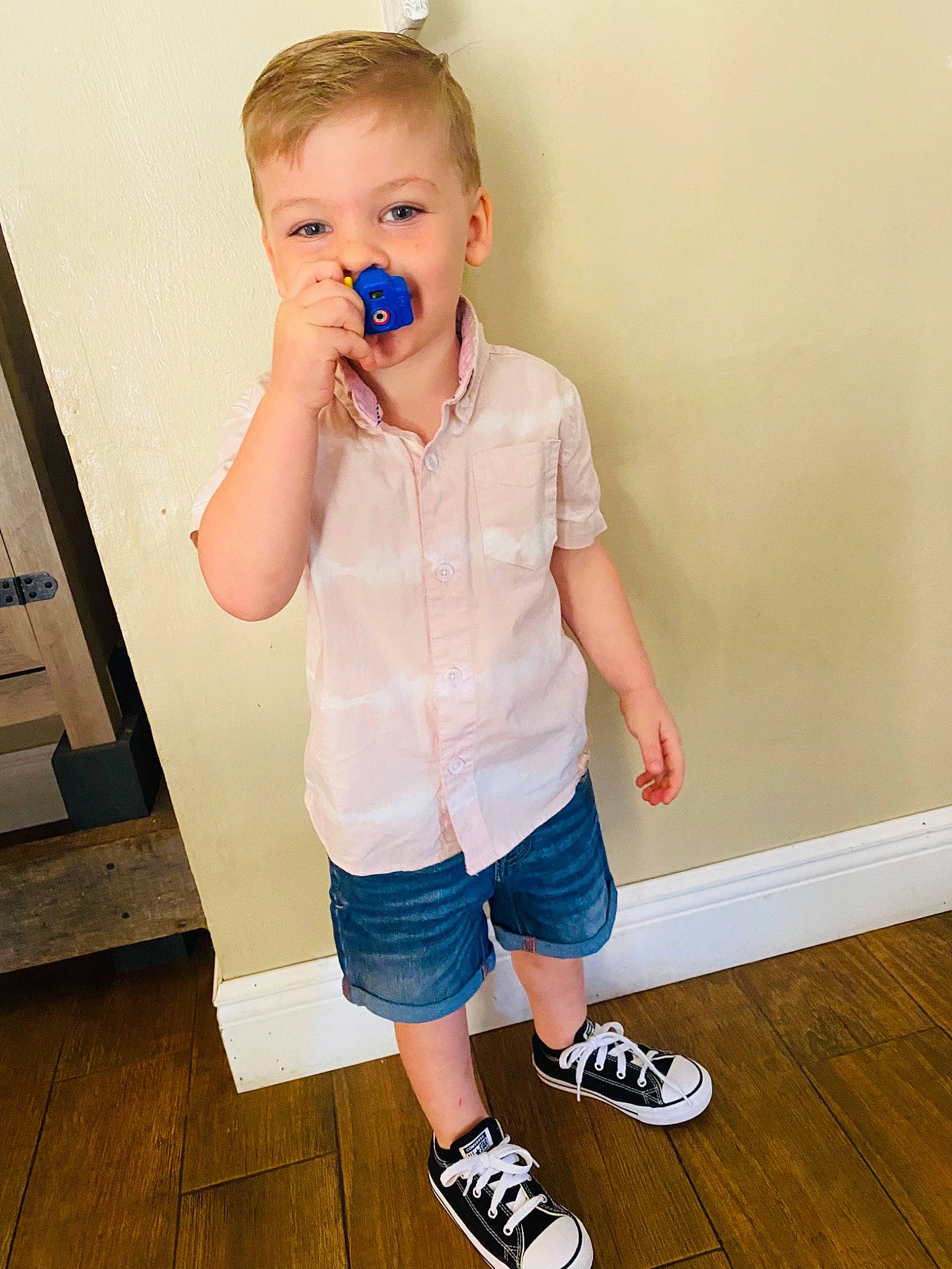 Miller is registered to the contest to win money with this photo: arm, baby_toddler_clothing, child, cool, eyelash, footwear, happy, joint, knee, neck, nose, person, shoe, shorts, shoulder, skin, sleeve, t_shirt, thigh, toddler