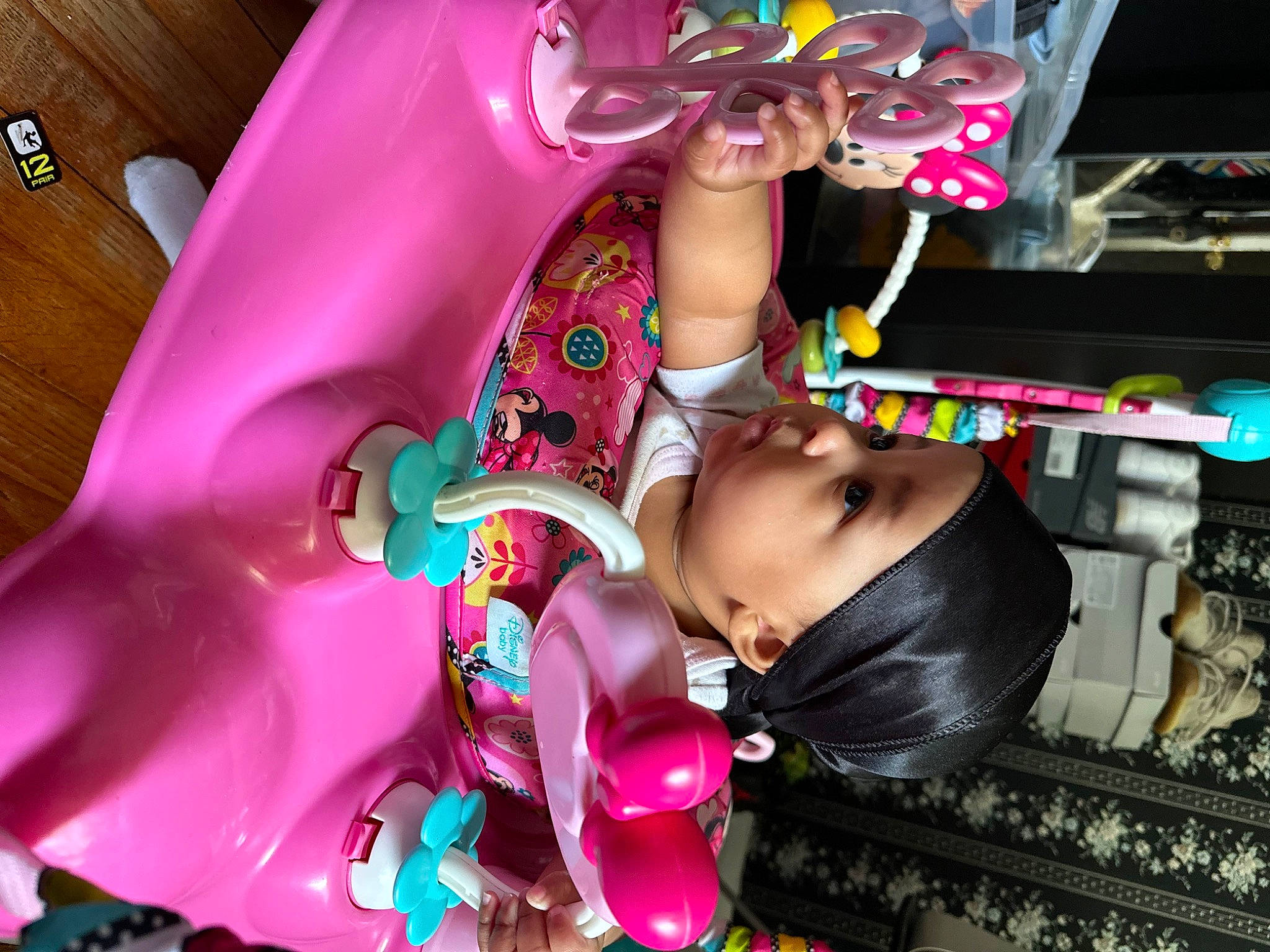 Armani is registered to the contest to win money with this photo: auto_part, baby, chest, child, event, eyewear, festival, fun, leisure, magenta, party, pattern, person, pink, plastic, purple, toddler, toy