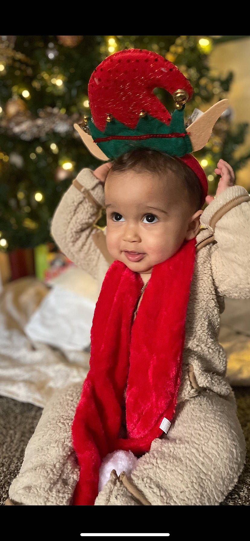 Jamison joined the competition — help win amazing prizes! baby, child, christmas, christmas_ornament, christmas_tree, costume_hat, event, eye, fashion_accessory, fun, fur, happy, hat, headgear, holiday, human_body, person, red, toddler, tradition