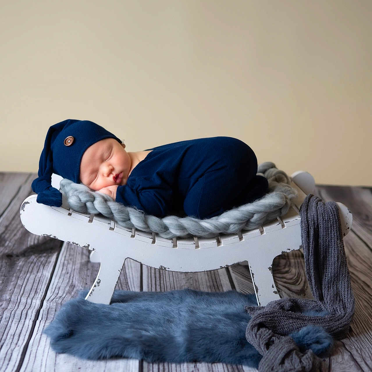 Brayden is registered to the contest to win money with this photo: animal, baby, bed, blanket, canine, cat, clothing, cushion, face, furniture, hat, head, homedecor, newborn, pants, person, pet, photography, portrait, sleeping