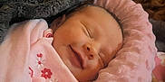 Daisy-Mae joined the competition — help win amazing prizes! baby, newborn, smile, sleeping, blanket, pink, soft, cute, child, wrapped, cozy, infant, face, clothing, portrait, resting, indoors, warm, peaceful, comfort
