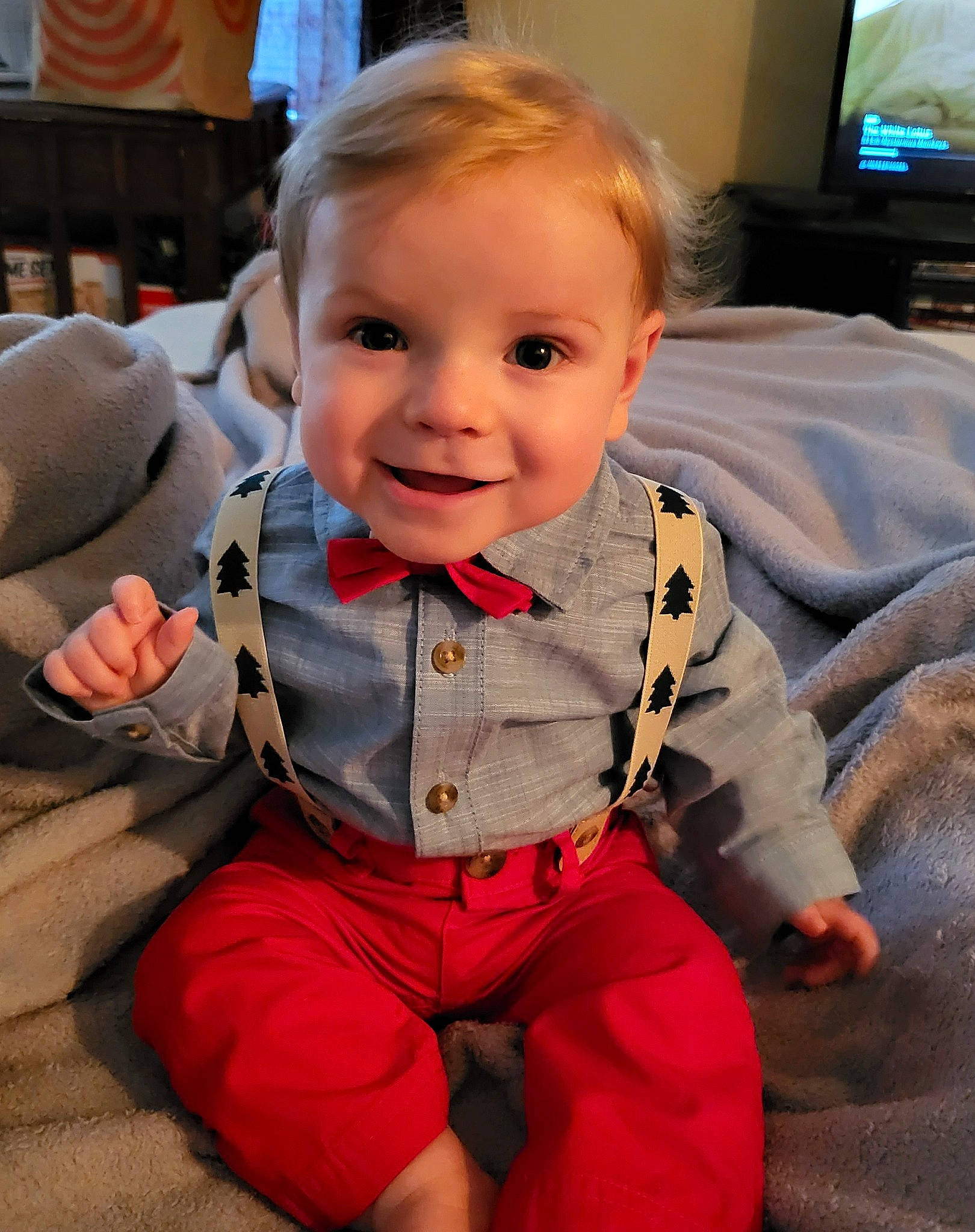 Emmerson joined the competition — help win amazing prizes! baby, baby_toddler_clothing, cheek, child, chin, eye, face, flooring, fun, happy, head, home_appliance, joy, nose, person, sitting, skin, sleeve, smile, television