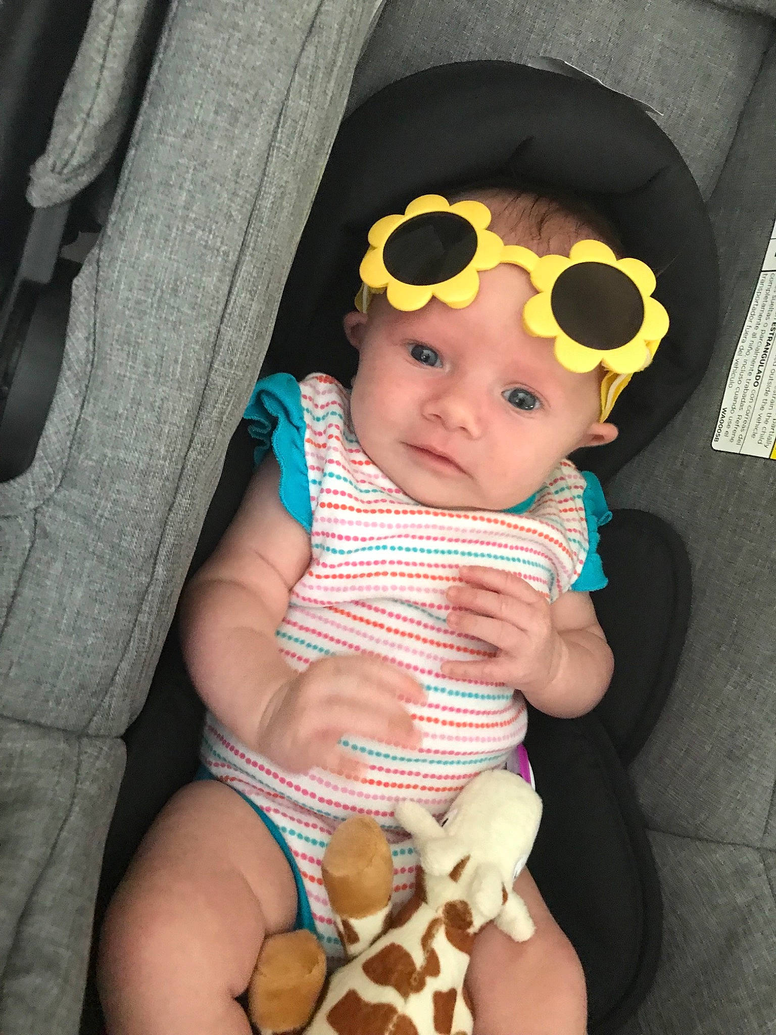 Alessandra is registered to the contest to win money with this photo: baby, baby_products, baby_toddler_clothing, child, cool, eyewear, glasses, headgear, person, product, skin, sunglasses, toddler, vision_care