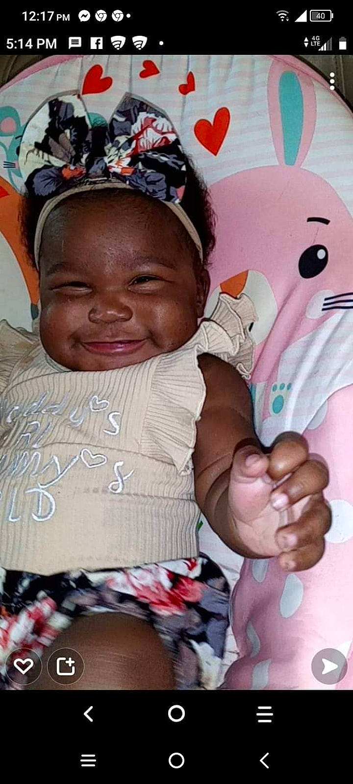 N'Ajayah joined the competition — help win amazing prizes! baby, baby_toddler_clothing, cheek, child, cool, facial_expression, finger, fun, gesture, hairstyle, happy, human, interaction, mouth, person, pink, skin, smile, textile, toddler