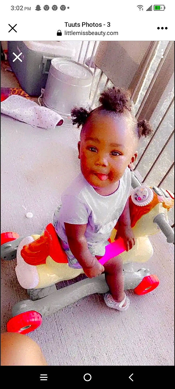 N'Ajayah joined the competition — help win amazing prizes! baby, baby_toddler_clothing, cheek, child, dress, eyelash, flooring, fun, happy, magenta, person, pink, red, shorts, sitting, sleeve, smile, sneakers, t_shirt, toddler