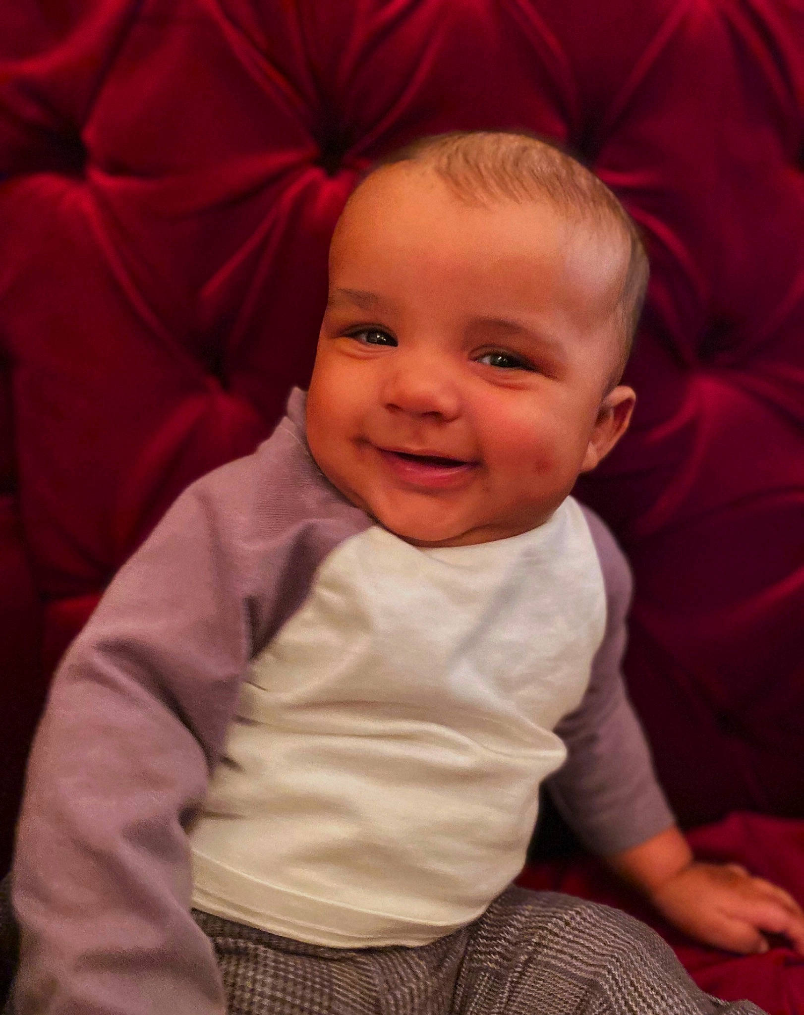 Kylen is registered to the contest to win money with this photo: baby, baby_toddler_clothing, cheek, chin, comfort, eye, finger, happy, head, human_body, iris, joy, lip, nose, outerwear, person, pink, skin, sleeve, smile