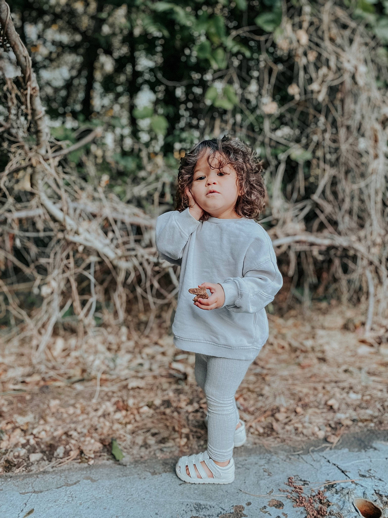 Ella Grace is registered to the contest to win money with this photo: blond, branch, brown_hair, doll, eye, fawn, forest, grass, hair, happy, leisure, lip, people_in_nature, person, plant, toy, tree, trunk, twig, wood
