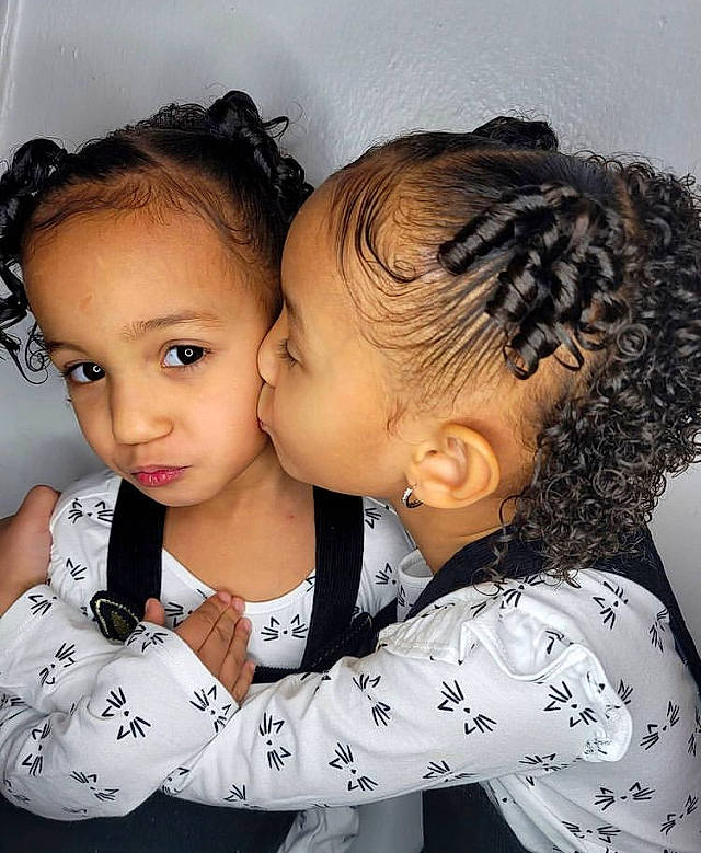 Leilanny joined the competition — help win amazing prizes! baby, baby_toddler_clothing, brown_hair, cheek, child, cornrows, ear, eyelash, forehead, hair, hair_accessory, hairstyle, head, hug, interaction, kiss, love, mammal, person, sharing