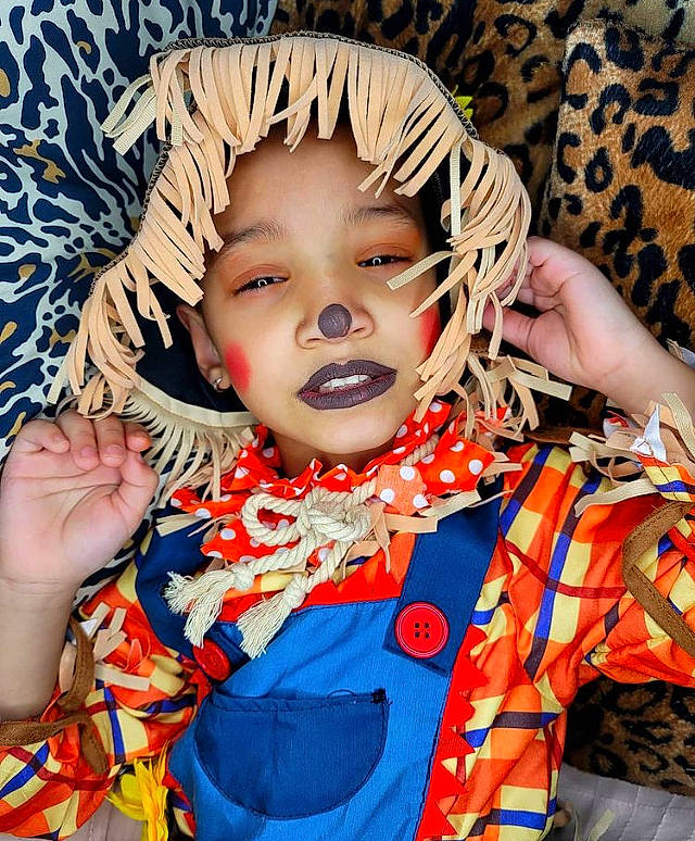 Jazlynn joined the competition — help win amazing prizes! baby_toddler_clothing, child_model, costume, eyelash, headwear, orange, person