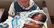 Serenity joined the competition — help win amazing prizes! child, newborn, baby, sibling, portrait, sleeping, smiling, hospital, chair, blanket, swaddle, infant, family, indoor, window, seated, holding, clothing, caring, photography