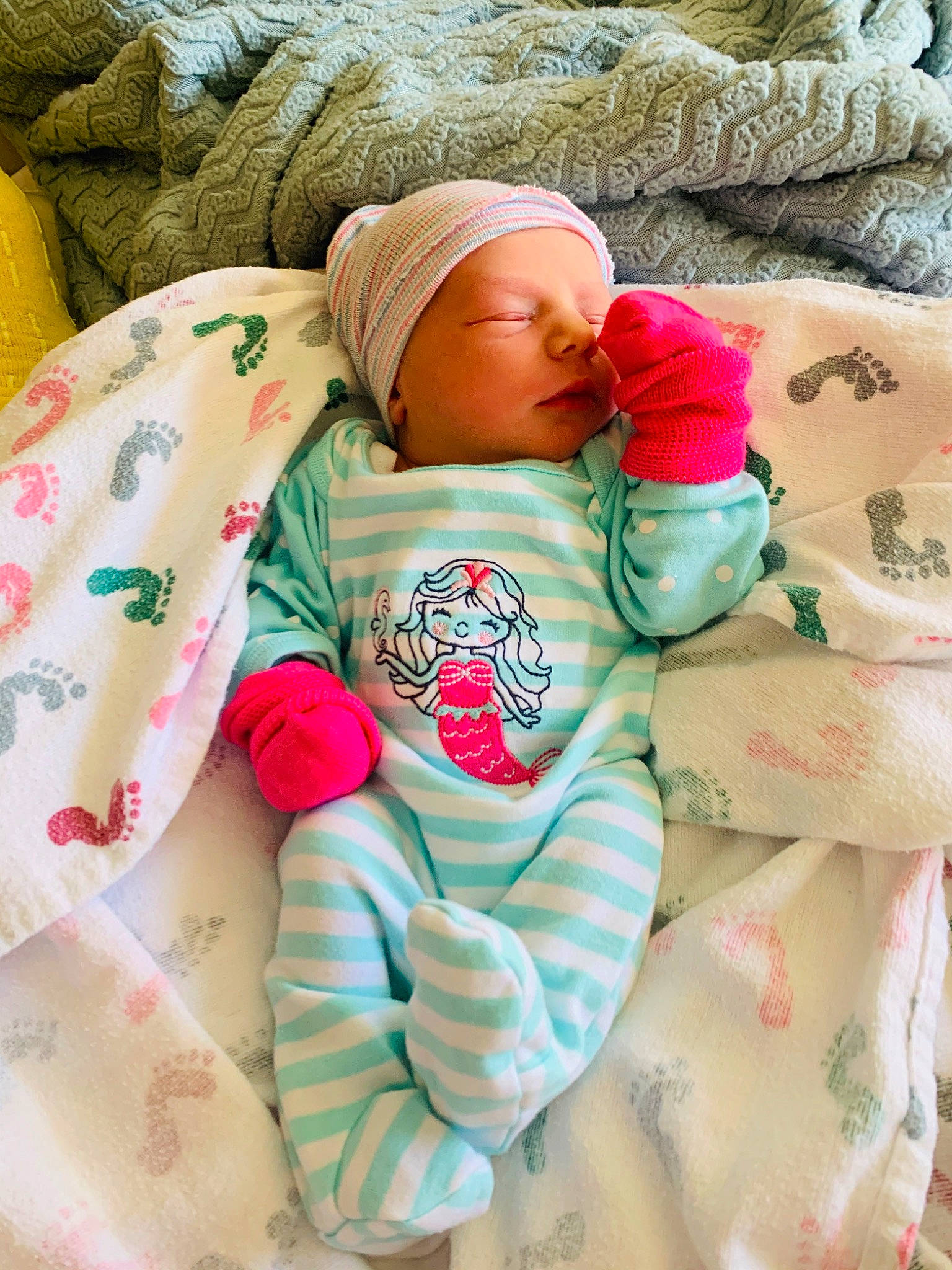 Haizlee is registered to the contest to win money with this photo: baby, baby_sleeping, bedding, bedtime, blanket, cheek, child, comfort, headwear, linens, nap, person, pink, skin, sleep, textile, toddler
