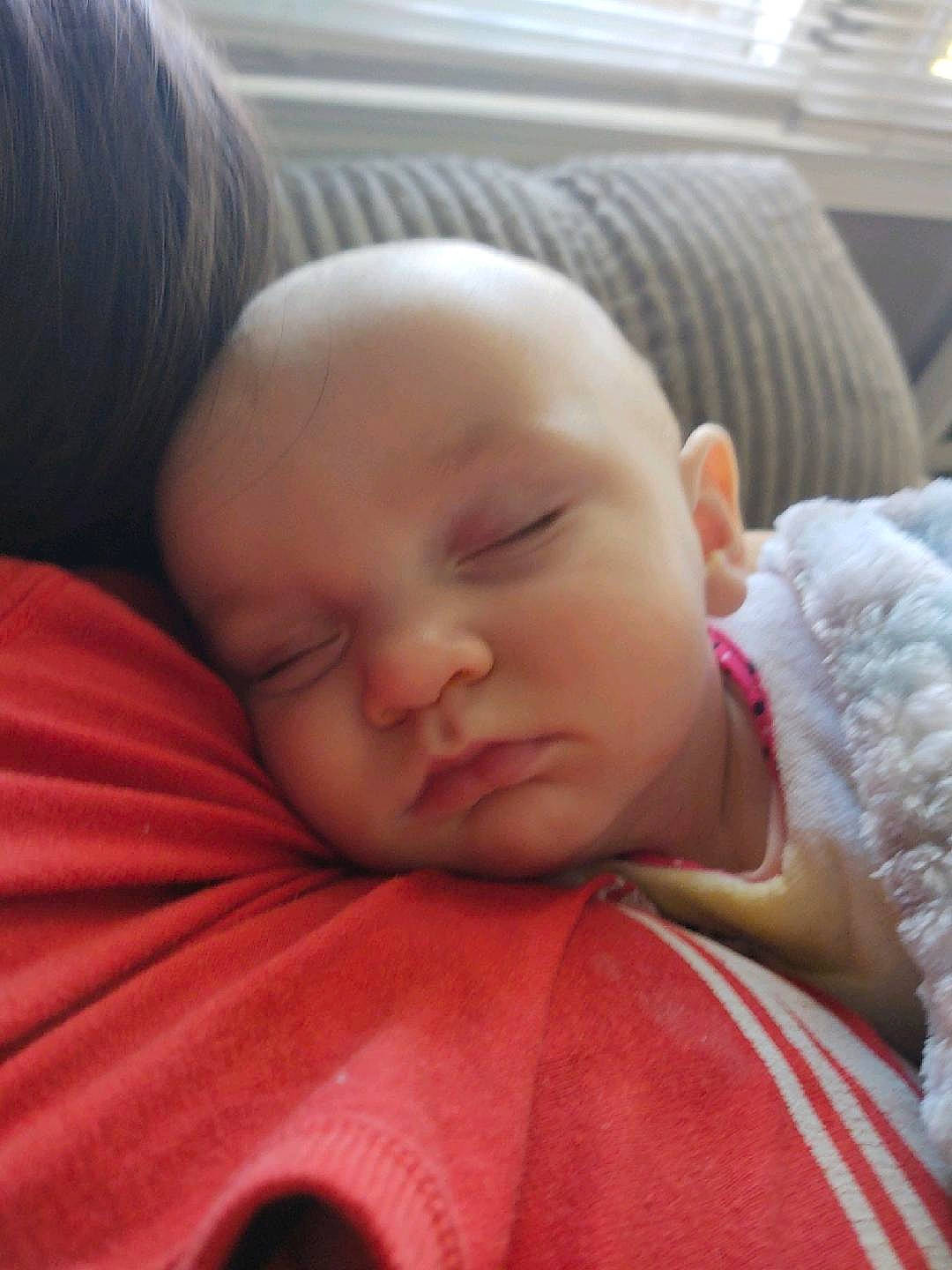 Gabi is registered to the contest to win money with this photo: baby, baby_sleeping, cheek, comfort, ear, eyebrow, eyelash, finger, forehead, gesture, hair, human_body, iris, lip, mouth, neck, nose, person, skin, sleeve