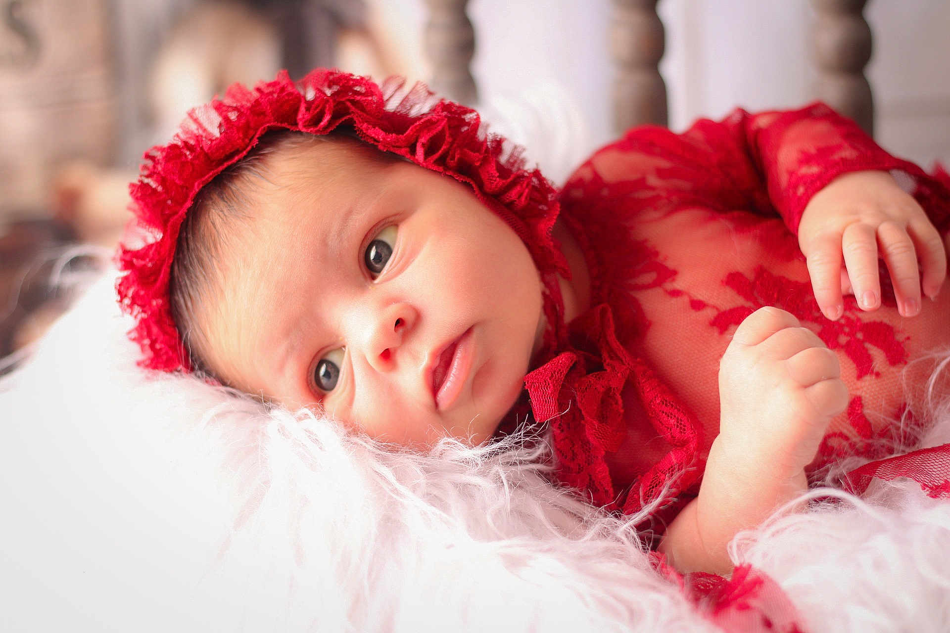 Mahina participe au concours pour gagner de l'argent avec cette photo : baby, infant, red_lace, bonnet, newborn, portrait, closeup, soft_light, fluffy_blanket, cute, child, face, skin, hand, lying_down, indoors, cozy, sleepwear, adorable, expression