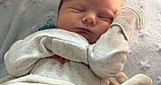 Mateo is registered to the contest to win money with this photo: newborn, baby, sleeping, blanket, cushion, soft, cozy, infant, peaceful, portrait, face, hand, quilted, fabric, cute, resting, indoors, clothing, closeup, child