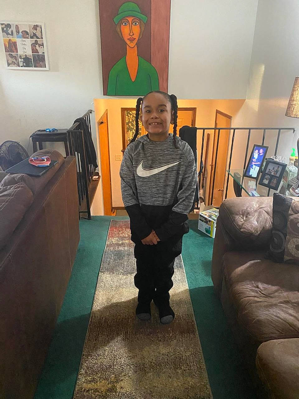 Javon joined the competition — help win amazing prizes! art, bag, comfort, couch, design, event, fashion_design, floor, flooring, fun, joy, living_room, luggage_and_bags, person, picture_frame, room, smile, sofa_bed, t_shirt, textile