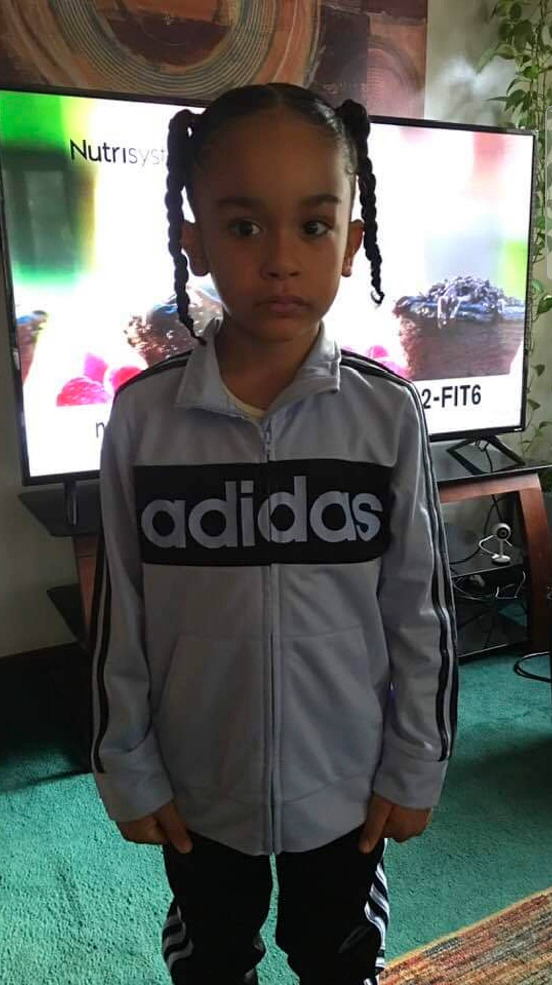 Javon joined the competition — help win amazing prizes! audio_equipment, beauty, black_hair, cool, cornrows, display_device, electronic_device, eyewear, fashion_design, gadget, hairstyle, headphones, jewellery, necklace, person, sleeve, sportswear, standing, t_shirt, television