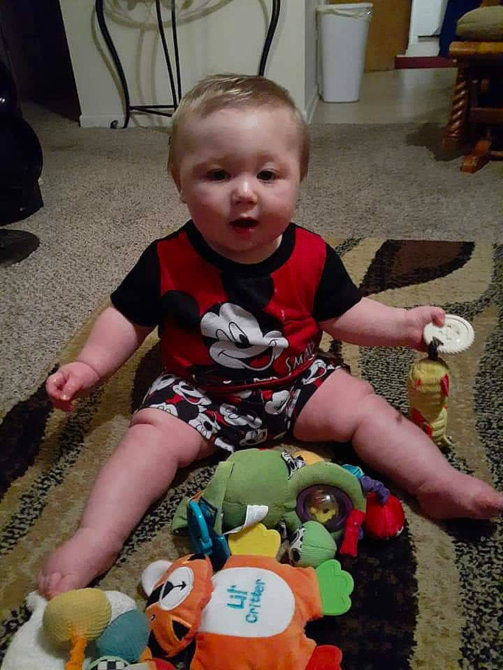 Curtis is registered to the contest to win money with this photo: baby, child, person, play, toddler