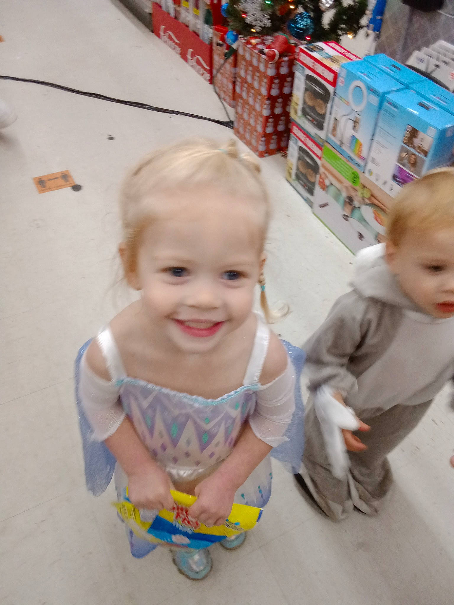 Brooklynn Nicole is registered to the contest to win money with this photo: baby, baby_toddler_clothing, box, cheek, child, eye, face, floor, flooring, fun, happy, joy, leisure, person, play, product, room, shelf, sitting, skin