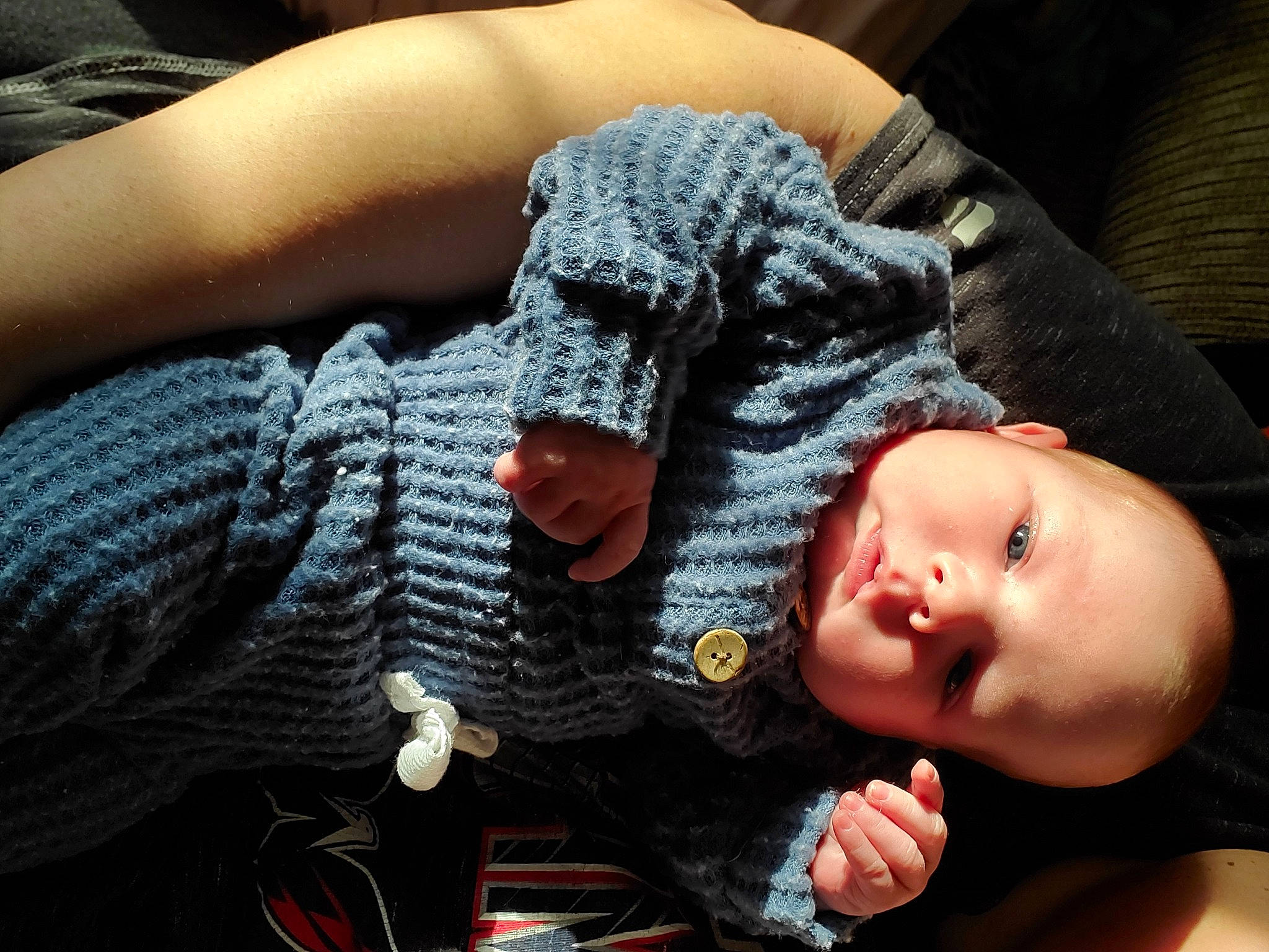 Abel is registered to the contest to win money with this photo: baby, baby_toddler_clothing, child, comfort, cool, elbow, electric_blue, finger, gesture, hand, human_leg, mouth, nail, person, plant, skin, sleeve, thumb, toddler, wool