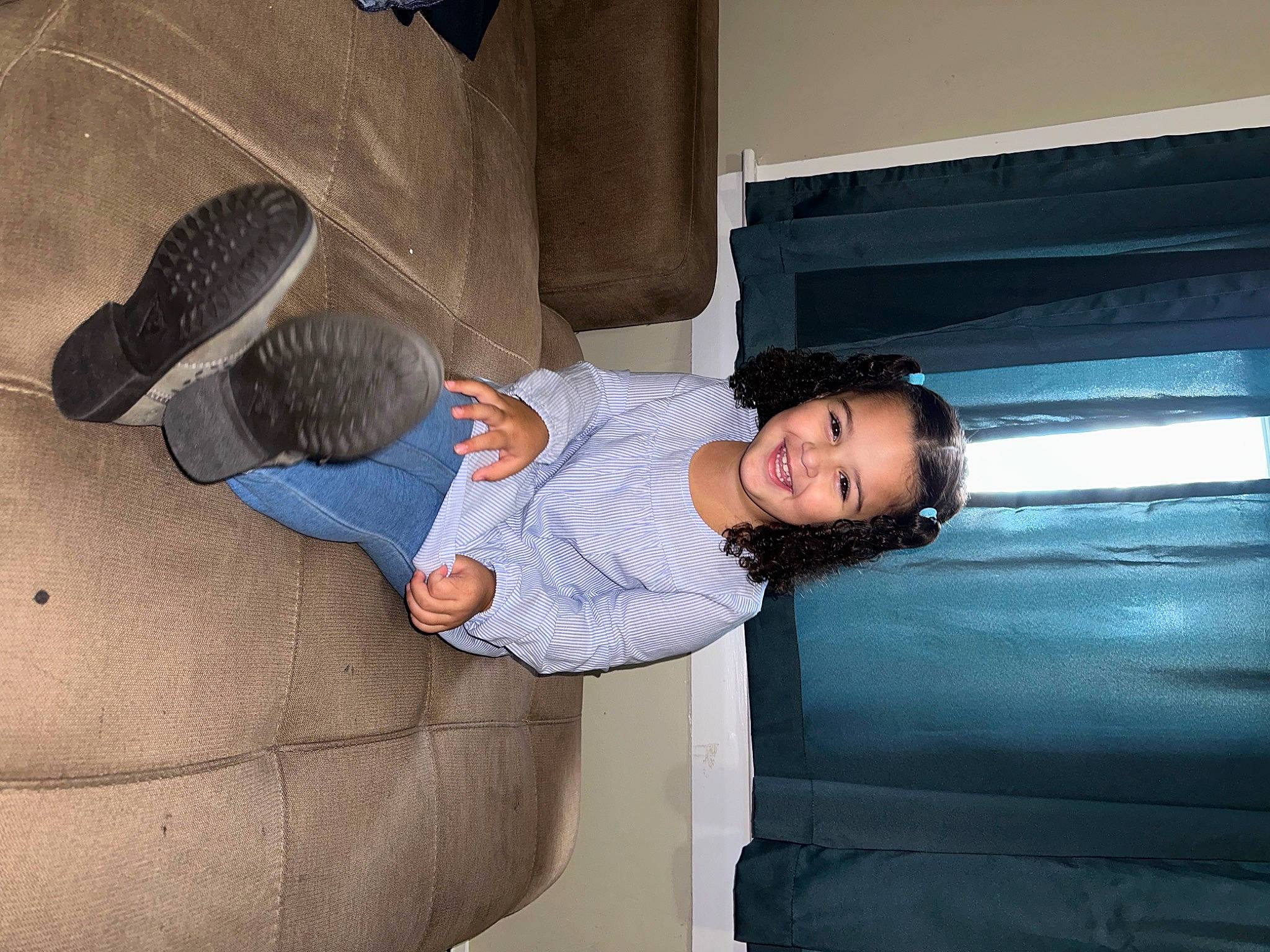 Seline joined the competition — help win amazing prizes! automotive_design, child, comfort, couch, denim, elbow, electric_blue, flooring, fun, human_body, human_leg, joy, knee, lap, leg, leisure, luxury_vehicle, person, room, sitting