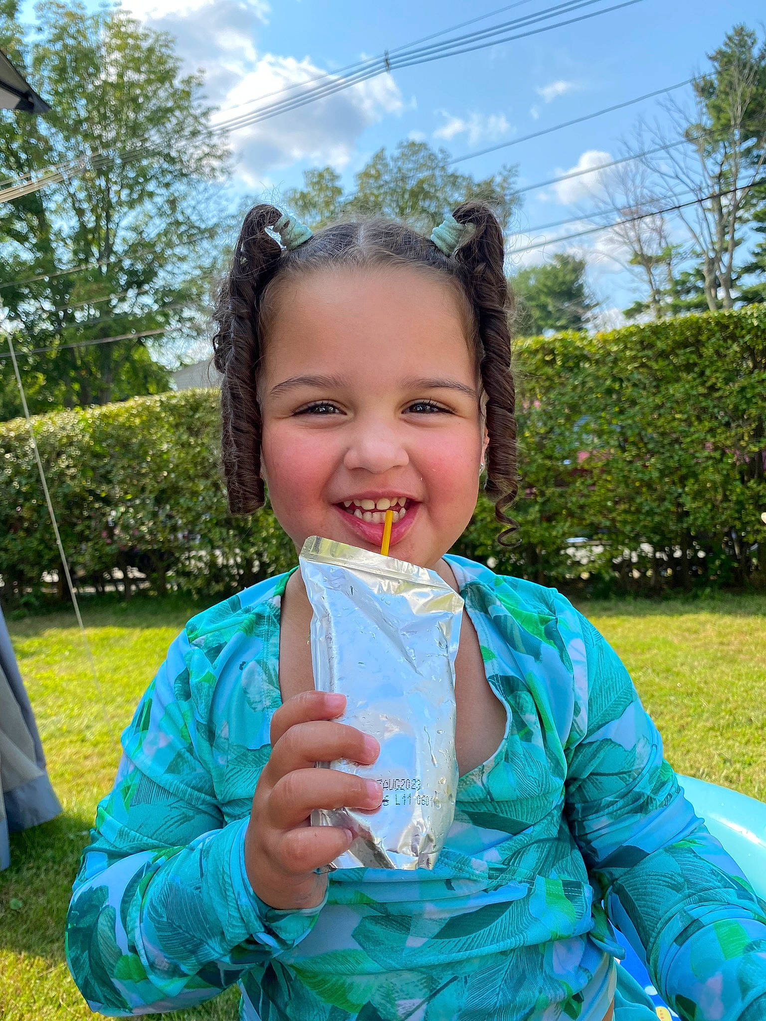 Seline is registered to the contest to win money with this photo: baby_toddler_clothing, child, cloud, electric_blue, event, fun, gesture, grass, grass_family, happy, joy, people_in_nature, person, plant, recreation, sky, sleeve, smile, summer, toddler