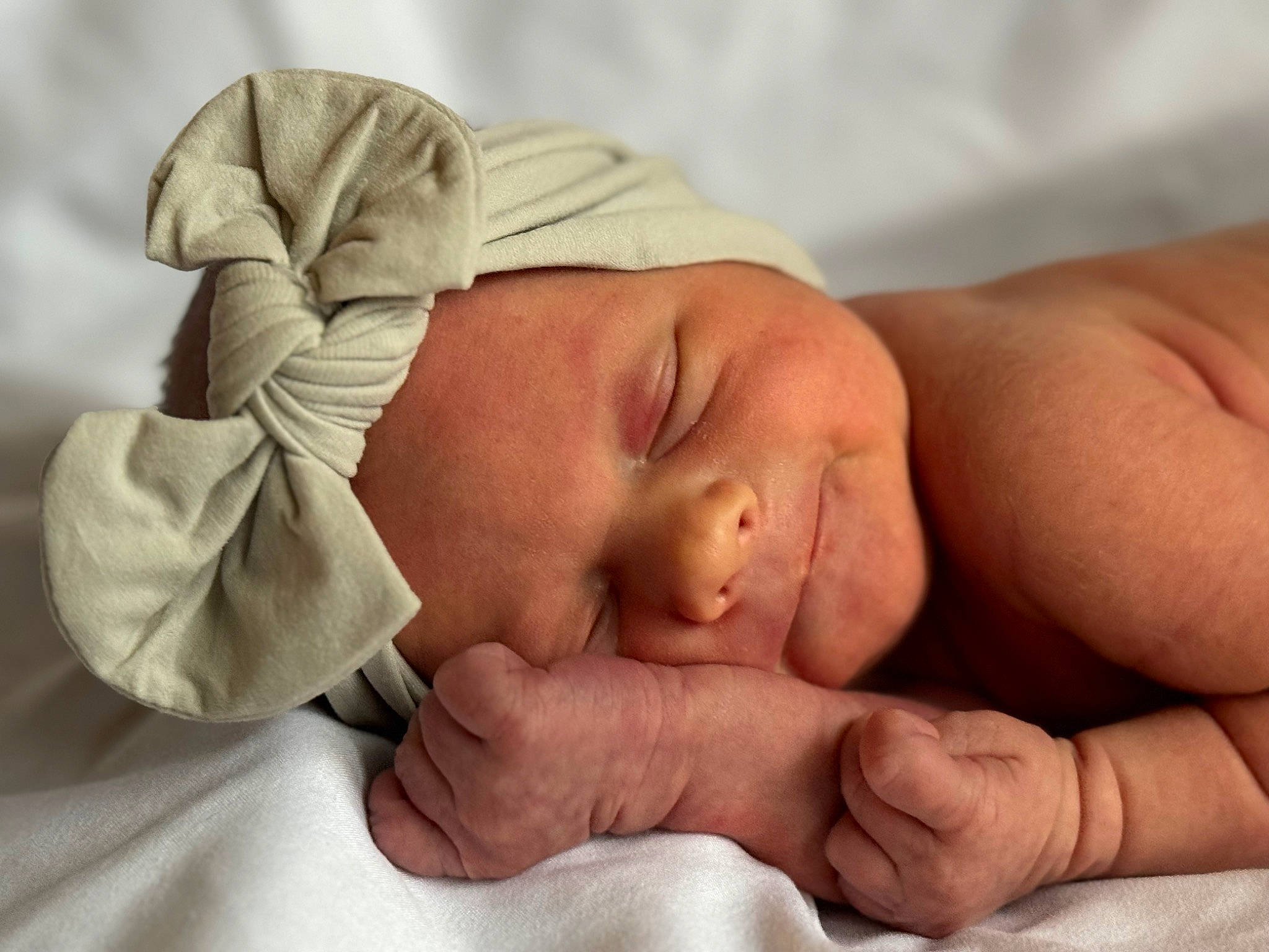 Evangeline joined the competition — help win amazing prizes! baby, baby_sleeping, baby_toddler_clothing, child, comfort, event, finger, flesh, gesture, headwear, nail, person, service, thumb, toddler, wrinkle