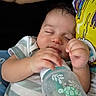 Demetrius joined the competition — help win amazing prizes! baby, bed, beverage, bodypart, bottle, clothing, couch, cushion, face, finger, furniture, hand, head, homedecor, newborn, person, photography, portrait, sleeping, t_shirt