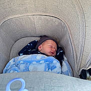Arlo joined the competition — help win amazing prizes! newborn, baby, sleeping, blanket, bassinet, hat, infant, cozy, resting, soft, fabric, child, cute, comfort, indoors, peaceful, portrait, wrapped, toddler, relaxing